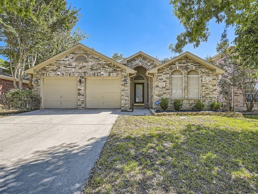 Click the Virtual Tour link to view the 3D walkthrough. This lovely residence is turnkey and ready for new owners! With lovely curb appeal and a recently refreshed exterior featuring freshly painted siding, this house is a true gem. Step inside and be greeted by bright interiors and beautiful dark hard surface flooring, both stunning and easy to maintain. The thoughtfully designed layout creates a sense of spaciousness and a welcoming atmosphere throughout. White cabinetry, accented by glass-faced cabinets, granite countertops, a subway tile backsplash, and high-end appliances, make the kitchen a visual masterpiece. The spacious living room boasts an eye-catching fireplace that adds both warmth and character to the room. Relax and unwind in the spacious primary suite with an updated bathroom complete with a large tub and a glass-enclosed shower, creating a spa-like experience. A privacy fenced backyard and expansive patio await outside. Don't miss this Stone Hollow beauty!