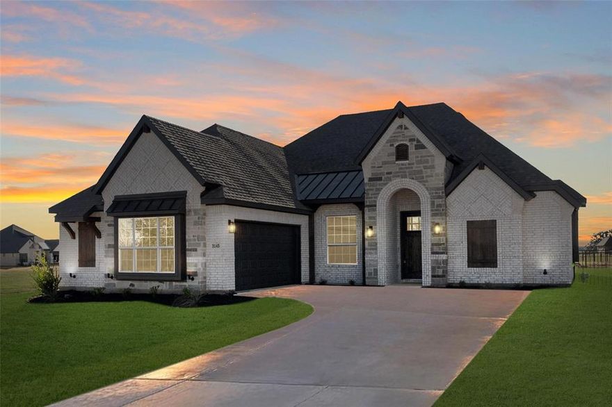 MLS# 20409893 - Built by Antares Homes - Ready Now! ~ Stone to Ceiling, Gas Starter Fireplace,-Covered Patio,-Study with Double Doors, Wood-look Tile Flooring, Welcome to your dream home! The open-concept kitchen is designed for entertaining with a central island, stainless steel appliances, granite countertops, beautiful white cabinets, and plenty of counter and storage space. Enjoy peaceful moments in the primary retreat – complete with vaulted ceilings, dual vanities, a large corner garden tub, a separate walk-in shower with a seat, and an enormous walk-in closet. The addition of two extra bedrooms with linen closets gives you the ample space you need for every family member to feel comfortable. The full-sized utility room that connects directly to the two-car garage ensures you can keep all your belongings organized with ease!!!