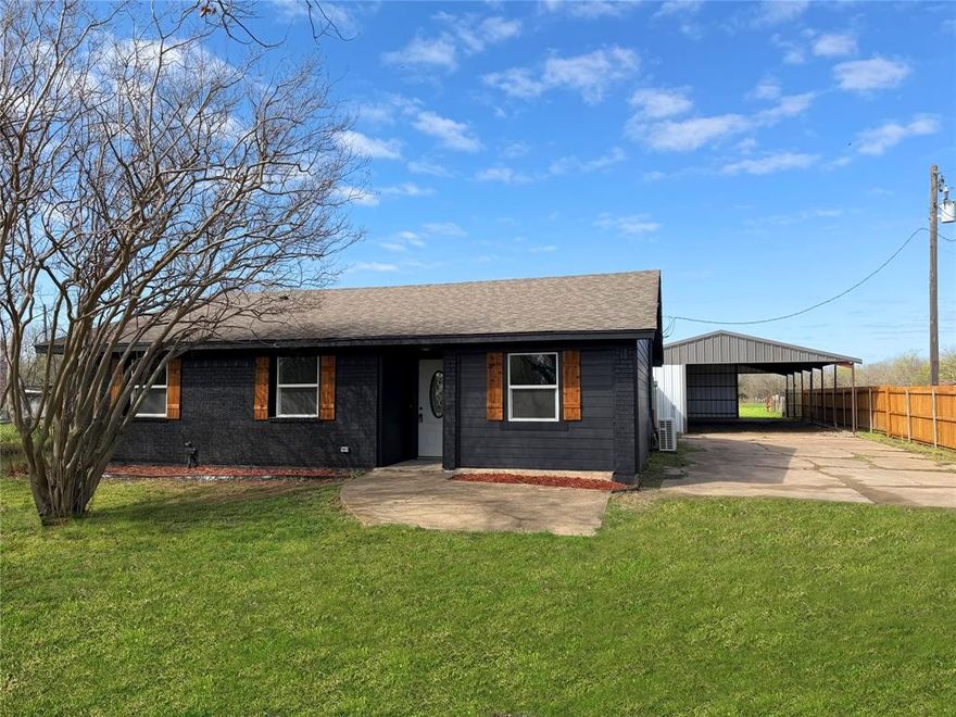 Charming Renovated Ranch on 2.5 Acres – Just Outside City Limits! Welcome to this beautifully updated 3-bedroom, 2-bath ranch home nestled on a private stretch of land just outside the city limits, where peace and modern comfort meet. The property includes a versatile 40' x 60' barn with electric and additional gravel paved parking, ideal for a workshop, guest space, or storage. Nearly every inch of this home has been thoughtfully renovated, making it truly move-in ready. Discover a fresh, inviting interior featuring all-new luxury vinyl flooring, updated lighting fixtures, and fresh paint throughout. The fully remodeled kitchen is a standout, complete with granite countertops, sleek new appliances (including a refrigerator that conveys with the sale), and a clean, modern design perfect for everyday living and entertaining. Both bathrooms have been completely renovated with quality finishes, while major systems have been updated for your peace of mind, including a brand-new HVAC system, updated plumbing, and new electrical service. Vinyl windows have also been installed, adding efficiency and charm. A recent foundation adjustment has been completed and is backed by a lifetime warranty. Outside, enjoy the privacy and space of your own acreage. If you're seeking a quiet, modern home with room to grow, this cozy ranch is the perfect blend of country living and contemporary updates.