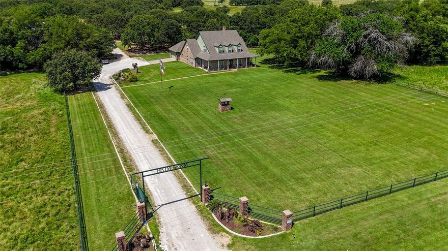 If you’ve been dreaming of wide open spaces and a slower pace of life, this is the place to make it happen. Nestled on 66 beautiful acres, this well-cared-for custom home offers the best of country living. With 3 stocked tanks full of catfish, abundant wildlife, and a layout that’s perfect for both everyday living and big gatherings, it’s no wonder this property is known as one of the most desirable in the area.

The home features 4 spacious bedrooms, including a private owner’s retreat downstairs, plus a dedicated office, three living areas, and a kitchen any home cook will love. From the quality woodwork throughout to the thoughtful layout, this home was built to last and built for comfort.

Step outside and you’ll find even more space to enjoy — an extended back patio for relaxing or grilling out, plus a party barn just a short walk away. It’s wired with electricity, has a half bath and industrial sink, and is the perfect spot for hosting reunions, weddings, or weekend get-togethers. There’s also a functional barn with working pens and a drive-through workshop with doors on both ends — ideal for horses, cattle, or farm equipment.

Whether you're looking for a weekend escape or a full-time homestead, this place has everything you need to enjoy the quiet, country lifestyle — all from the comfort of a front or back porch built for soaking it all in.