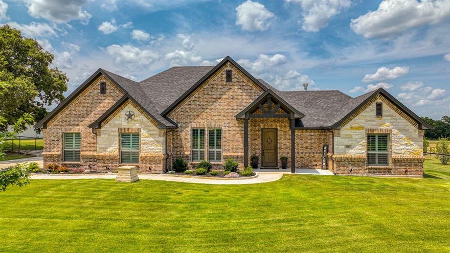 Welcome HOME to 1144 Paradise Parkway in Poolville, Texas. This meticulously designed 3-bedroom, 2-bathroom abode welcomes you with vaulted ceilings adorned with rustic wood beams and an inviting floor-to-ceiling wood burning fireplace, perfect for cozy evenings. The chef-inspired kitchen showcases a sleek gas cooktop and a walk-in pantry. Outside, the allure continues with a covered patio featuring yet another fireplace, overlooking a refreshing saltwater pool AND a spa! Additionally, the property boasts a 24x40 shop complete with a covered carport, and a man cave! Nature enthusiasts will appreciate the two well-maintained chicken coops and a flourishing garden equipped with a convenient sink, irrigation system, and a functional greenhouse. This is more than just a home; it's a sanctuary offering an unparalleled blend of comfort, functionality, and outdoor splendor. Don't miss the opportunity to witness the magic of this extraordinary property! Txt ZEAL11 to 88000 for more info!