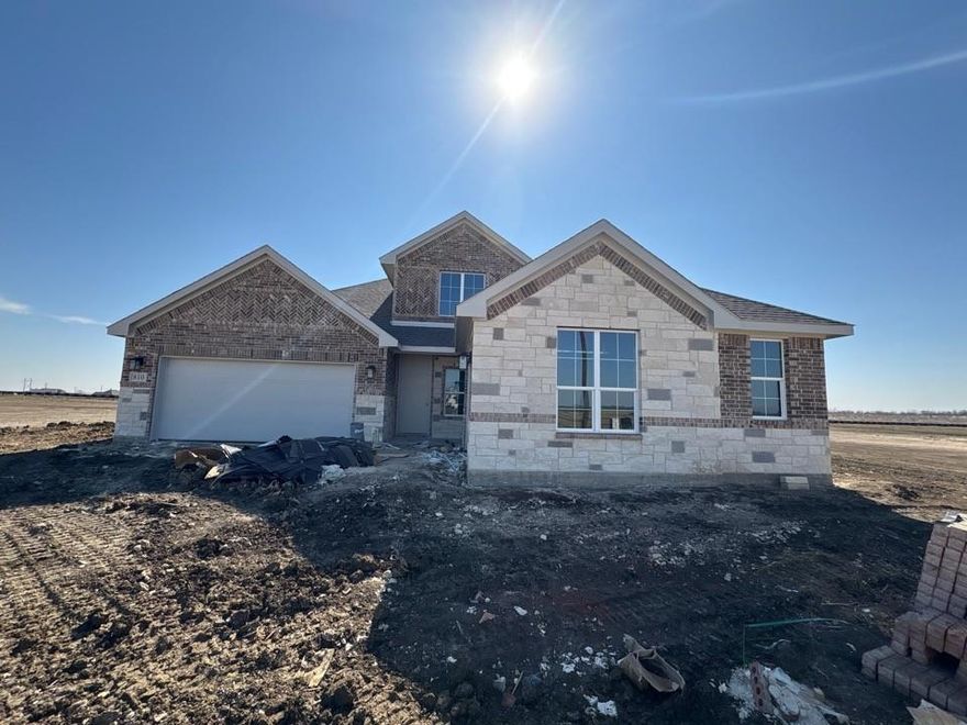 Estimated March 2026 completion! Ask us about our Trade In Trade Up program, we can buy your home! As soon as you enter the foyer, you have an adjacent study—or whatever way you want to use this flex room. Stroll past the staircase, powder room, and vestibule that leads to a bedroom with an ensuite bathroom. Straight ahead, the home opens up into a spacious, open concept floor plan that is perfect for entertaining or hosting family for the holidays. The family room connects with a chef’s kitchen that includes the convenience of a large island, double sink, and walk-in pantry. Just beyond the kitchen is your casual dining area that serves up views of the covered patio and the backyard beyond.