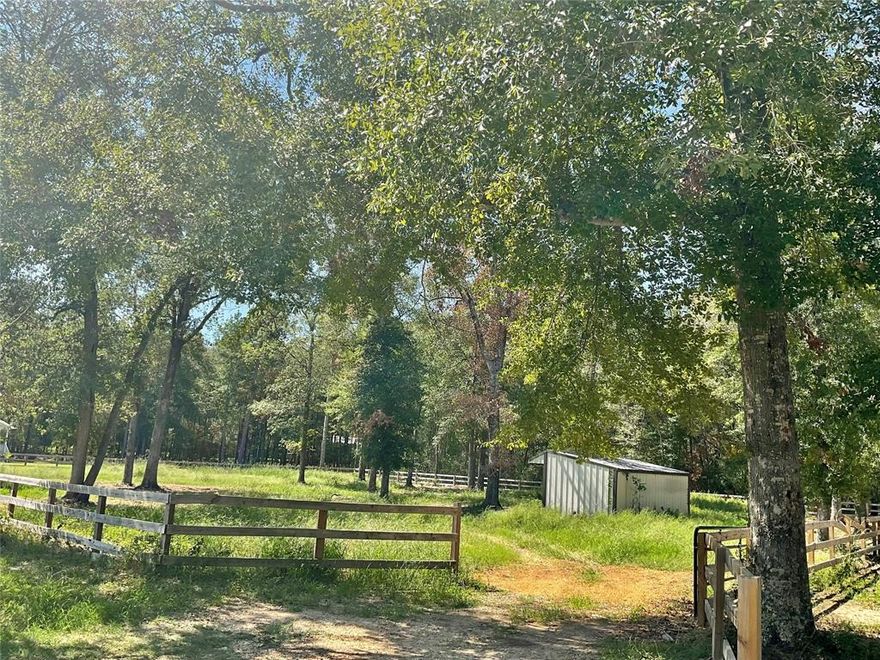 Country living near town! 1.18 acres just outside the city limits. 264 sq ft run in shed. Wood fence.