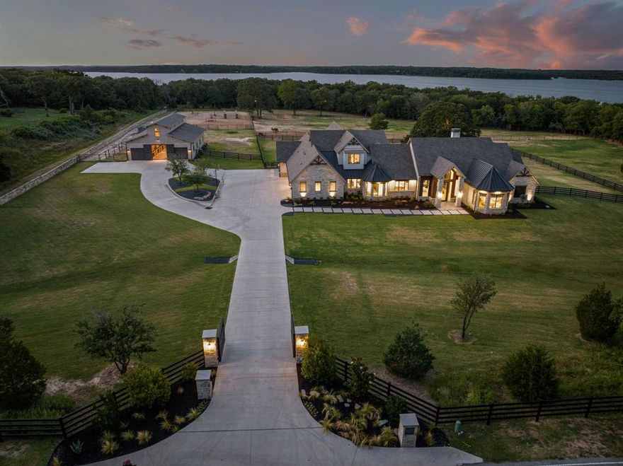 Experience unparalleled tranquility on this serenely beautiful 8.4 acres along Lake Grapevine's Corp property with a 2021 custom home that blends contemporary architecture, understated elegance and warm spaces with sprawling views of the negative edge pool, pastures, and trees. Discover the quiet pastoral side of Southlake with all the amenities of a newly built home including first floor living with the primary and guest suite, study, game room and media room on the first floor plus indulge in a kitchen with scullery, wet bar, secret rooms, expansive laundry room plus 910 sq ft outdoor living and kitchen with gas firepit, infinity edge pool, plus a 20 KW Generator. A 4-stall, pine lined barn, plus wash stall, tack room and storage space will ensure the happiness of your equine friends as they enjoy access to private runout, sand foot arena and 3 pastures. Spend your days exploring the hike-horse trails and enjoy sunsets and evenings under the Texas sky. Open Enroll to CISD.