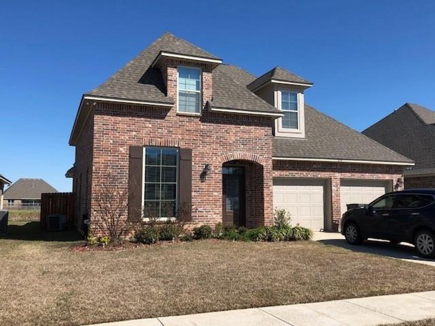 2 Story home with an open floor plan. Special features include Gas stainless steel appliances, 3cm slab granite countertops in the kitchen and bathrooms and around the fireplace. Undermount sinks, garden tub and separate shower in Master which is located downstairs. 3 Bedrooms and a full bathroom located upstairs. Tankless Hot water heater and oil rubbed bronze fixtures. Fenced in back yard. 2 car garage. Neighborhood has individual mailboxes, sidewalks. Home is available now.