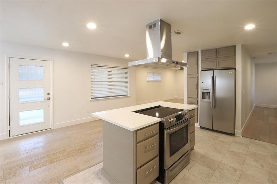 This stylishly updated 3-bedroom, 2-bathroom home blends timeless charm with modern comfort - now featuring a brand-new roof (2025)! Set on a generous 7,500 SF lot in a quiet, established neighborhood, it offers an open-concept layout ideal for both relaxed daily living and entertaining guests.

Interior highlights include durable wood-look vinyl flooring, sleek quartz countertops, fresh paint, and a bright kitchen that connects effortlessly to the dining room, anchored by a striking light fixture. The kitchen comes equipped with an electric range, vent hood, and included refrigerator - ready for your next home-cooked meal.

The oversized laundry area doubles as a pantry or mudroom. Both bathrooms have been tastefully refreshed, and a spacious den provides a second living area, ideal for a media room, playroom, or home office.

Additional features: brand-new roof (2025), refrigerator included, window blinds throughout, 2-car driveway.

Just 15 minutes from Downtown Dallas, this move-in ready home delivers space, style, and convenience - all at exceptional value.