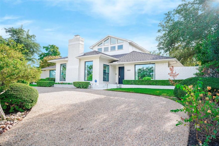 Preston Hollow modern, timeless, and custom built ranch style home. A stunning home designed for the ultimate in entertainment with an open-concept layout that seamlessly blends indoor & outdoor living. Situated on a perfectly manicured corner lot with a private wrap around yard.  4 bedrooms + office. The spacious living areas are filled with natural lights & soaring ceilings, covered with the highest quality wood flooring, programmable blinds, RH custom draperies, and a 100” electric fireplace with floor-to-ceiling stone facade wall. Chef’s kitchen features custom cabinets and commercial grade appliances that opens to the breakfast and side patio for outdoor eating & entertaining. Master bedroom looks out to a zen garden. First-class hotel style master bath has full view and access to the oasis pool. The resort style backyard features a heated pool, waterfall & spa, covered patio, towering palm trees, 8ft privacy fence, and electric gate that provides ample privacy.