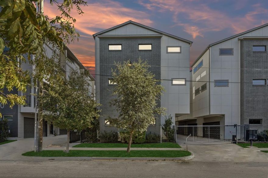 Light-filled, clean, and modern, this beautifully maintained East Village condo features a smart layout with comfortable living areas and quality finishes. Gorgeous hand-scraped hardwood floors set the tone as you enter the open and airy space, where tall ceilings and expansive windows create a bright and welcoming atmosphere.

The living area flows easily into the kitchen, making it ideal for everyday use as well as entertaining. The kitchen includes granite countertops, ample cabinet storage, a large island, a large pantry, and stainless steel appliances. A covered balcony provides a great spot for morning coffee or unwinding in the evenings. The first-floor home office offers privacy and a quiet place to work.

The primary suite includes an oversized bedroom, a walk-in closet, and a sleek bathroom with dual sinks and a spacious stand-up shower with a bench. The top floor also features a guest suite with its own ensuite bath.

Additional highlights include an attached two-car garage and gated access for added privacy and peace of mind. With low-maintenance living and a location that’s hard to beat, you’ll enjoy being just moments from East Dallas favorites like Knox Henderson, Lower Greenville, Deep Ellum, Cityplace, Uptown, and numerous restaurants, shops, and nightlife options. A must-see home at an incredible price in one of the city's most convenient neighborhoods.