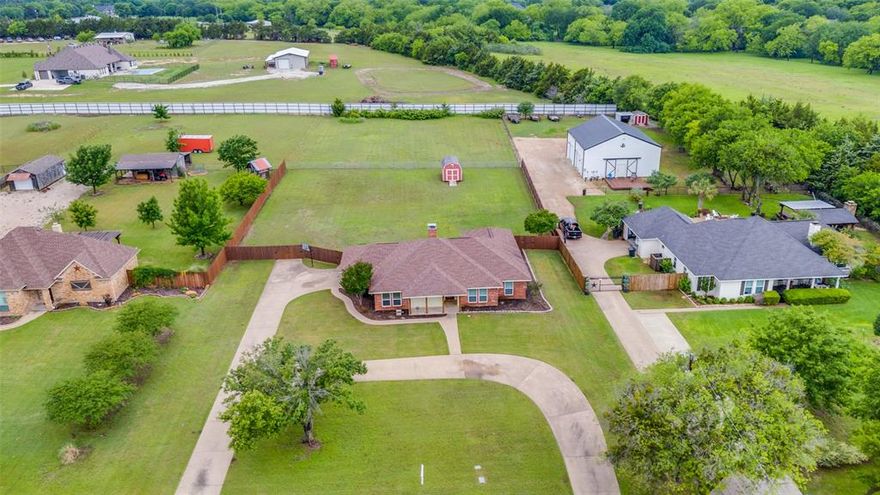 Discover your Texas dream with this beautiful home on a sprawling 1.29-acre lot –offering endless outdoor potential for gardens, gatherings, and enjoying peaceful privacy. 

Step inside and discover a welcoming atmosphere in this well-maintained home. The interior layout provides a practical flow, ideal for both everyday living and entertaining. The wood-burning fireplace adds warmth and character to the living area, while the kitchen boasts plentiful cabinets, casual dining at the bar and stainless steel appliances. 

The primary bedroom en suite includes a double vanity, bathtub and separate shower. You also have direct access from this bedroom to the covered patio and backyard, ideal for watching the sunset. 3 more bedrooms make this home idea for growing families as well as space for guests.

Located in desirable Midlothian, you'll find a blend of suburban tranquility with easy access to amenities and highly rated schools. This is space, comfort, and location combined – your Midlothian gem awaits!