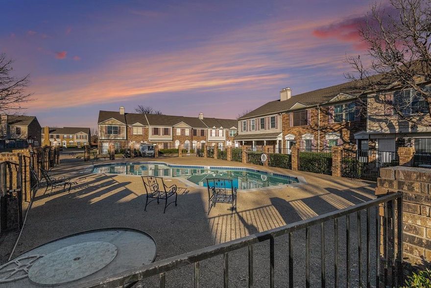 Welcome home to this charming two-story condo, perfectly positioned for effortless living and easy commuting with quick access to the George Bush Turnpike and all corners of the DFW Metroplex. Located near vibrant shopping centers, popular restaurants, and Firewheel Town Center, this home places convenience, entertainment, and everyday essentials right at your doorstep. Inside, a thoughtfully designed floor plan blends comfort with low-maintenance living. The inviting living room is centered around a cozy wood-burning fireplace—perfect for relaxing on cool Texas evenings—while durable tile flooring throughout the main level offers both style and practicality. The kitchen features granite tile countertops and stainless steel appliances, including a smooth-top electric range, microwave, dishwasher, and refrigerator, all included for move-in ease. Upstairs, ascend the staircase to discover two generously sized bedrooms, each offering a tranquil retreat. The primary full bathroom, appointed with modern fixtures, serves both bedrooms with ease and privacy. Conveniently located upstairs as well, the laundry area includes a stackable washer and dryer—making everyday routines simple and efficient. Step outside to your private, fenced courtyard patio, ideal for morning coffee, quiet evenings, or entertaining guests, with peaceful green space just beyond. When summer arrives, enjoy a refreshing walk to the community pool and soak up the sunshine. Assigned parking directly in front of the unit ensures quick and effortless access. The HOA enhances your lifestyle by maintaining the exterior landscaping and covering water, sewer, and trash—allowing you to enjoy truly low-maintenance living. Move-in ready and thoughtfully appointed, this home presents an excellent opportunity to own rather than rent. ***Special financing is available for qualifying first-time homebuyers with Seller's preferred lender—call for details.***