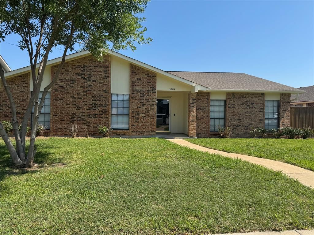 Photo of 5204 Gulfport Drive, Garland, TX 75043 (MLS # 21048854)