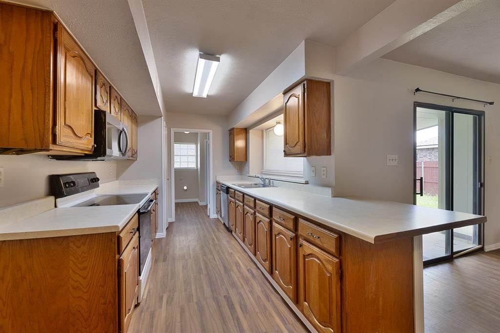 Photo of 5204 Gulfport Drive, Garland, TX 75043 (MLS # 21048854)