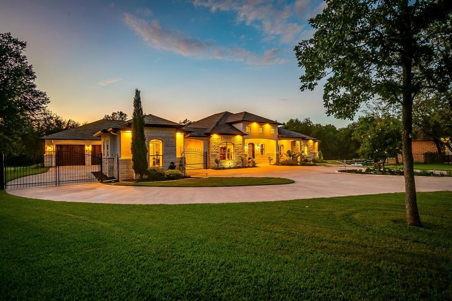 Nestled within the prestigious community of La Cantera West, this Mediterranean-inspired residence offers a refined blend of elegance, comfort, and functionality. From the moment you step inside, you are greeted with expansive windows that frame captivating views of the backyard oasis, filling the home with natural light and creating a seamless connection between indoor and outdoor living. Designed with both entertaining and everyday living in mind, the layout features a formal dining room, butler’s pantry, gourmet kitchen, spacious breakfast area, and an inviting family room—perfect for gatherings of any size. The chef’s kitchen offers abundant counter space and custom cabinetry, setting the stage for both casual meals and formal celebrations.The primary suite is a serene retreat overlooking the picturesque backyard, complete with a spa-like bathroom featuring dual vanities, a large walk-in shower, garden tub, and a custom-designed closet that combines function with sophistication. Additional highlights include a large private office ideal for today’s professional, plus two generously sized bedrooms with en-suite baths—one with its own private wing and living area. Rich woodwork details on the living and study ceilings add timeless warmth and craftsmanship. The exterior continues to impress with a porte cochere leading to a private guesthouse with full bath, offering the perfect space for visitors or extended stays. Outdoor living takes center stage with a cabana designed for entertaining, complete with built-in BBQ, Big Green Egg, and ample room for gatherings. The sparkling pool and tranquil setting further enhance this entertainer’s paradise. Perfectly located less than 30 minutes from Lockheed Martin and Downtown Fort Worth, this exquisite estate embodies the ultimate balance of luxury, privacy, and convenience.