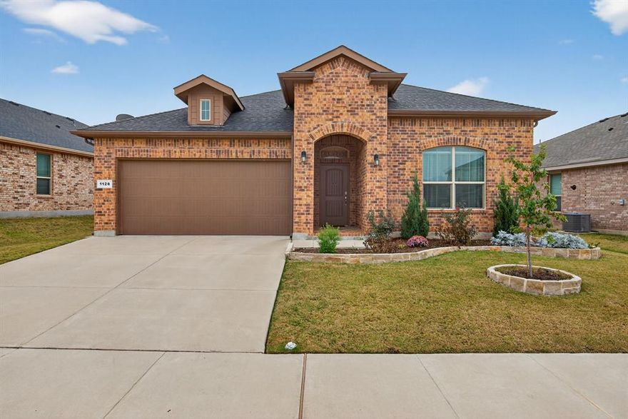 Step into style, space, and comfort in this beautifully maintained 4-bedroom, 2-bath home, built in 2019 and ready to impress! Located in the sought-after Northwest ISD and just minutes from Alliance Town Center, you’ll be close to fantastic shopping, dining, and everyday conveniences.

Inside, you’ll love the bright, open-concept layout that seamlessly connects the living, dining, and kitchen areas — perfect for entertaining or simply enjoying daily life. The chef-inspired kitchen features a spacious granite island, sleek finishes, a dry bar, and plenty of prep and storage space.

The split-bedroom design provides privacy, while the generous primary suite and full-size laundry room offer both comfort and convenience. Step outside to a covered patio, ideal for weekend grilling or unwinding at the end of the day.

This home has been lovingly cared for, shows beautifully, and is truly move-in ready — don’t miss your opportunity to make it yours!