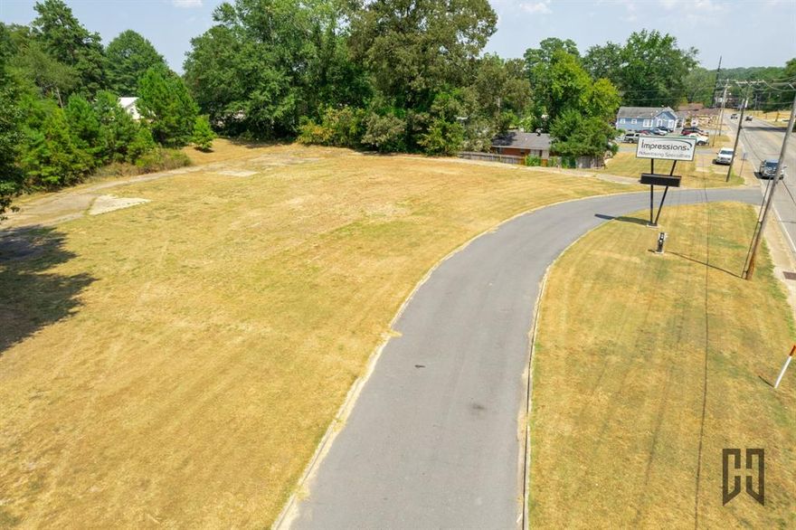 PRIME COMMERCIAL OPPORTUNITY!  Looking for the perfect location to build your business? This high-visibility, high-traffic property sits on over an acre of cleared land in a main thoroughfare—ready for development! With over 300 feet of road frontage, your business will be a sitting billboard for thousands of daily passersby. Circle entrance & exit for easy access.  All utilities in place – build with ease! Minutes from I-20 – 20 mins to Bossier, 35 mins to Ruston; Endless possibilities – Ideal for a strip mall, Dollar General, car lot, restaurant & more! Located at the previous site of Impressions Advertising, starting at the corner of N. Fairview Street. Opportunities like this don’t last long! Call today for details and make this prime spot yours! Commercial Real Estate, Prime Location, Business Opportunity.  Bring all offers!!