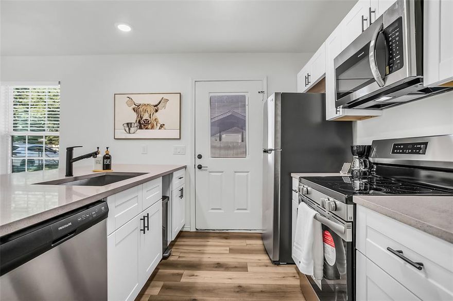 Finally an affordable and stylish new home built with quality! Thoughtfuly designed to bring luxury looks to an afforable price point! Soft close kitchen cabinets, stainless steel appliances, LED lights throughout and ceiling fans in all bedrooms. You won't be disappointed when you walk into the large open living area with eat in kitchen and dining room. Full size laundry room with washer and dryer hookups. Incredible and efficient floor plan with plenty of storage space featuring large walk in closets in 2 of the bedrooms. Large primary suite with private attached full bath and walk in closet. Full size washer and dryer area. Fully fenced backyard which is a rare upgrade for new homes in this price range. Next to several neighborhood parks and a large green space.