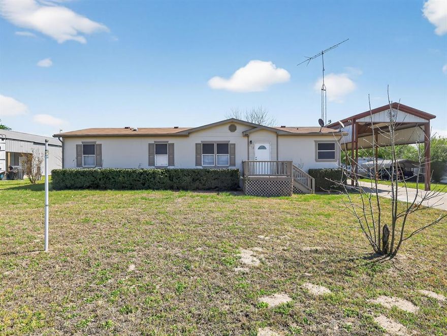 Welcome to your dream home nestled in the peaceful neighborhood of Sunset Shores, Quitman, Texas. This charming 3-bedroom residence, offering 1,500 square feet of comfortable living space, is perfectly suited for family life and entertaining. Upon entering, you'll be greeted by a spacious and inviting living area with plush carpeting, providing a warm and cozy atmosphere. The open-plan kitchen is a chef's delight, featuring sleek countertops, modern appliances, and ample cabinetry, ensuring plenty of space for all your culinary needs. Each of the three bedrooms is generously sized, providing a serene retreat with natural light filtering through the windows. The bathrooms boast stylish fixtures and plenty of storage for convenience. Outside, a large yard offers endless possibilities for gardening, play, or simply relaxing under the Texas sky. The home's exterior promises low maintenance while retaining its charm, complete with a welcoming front porch. Enjoy the tranquility of Sunset Shores while being just a short drive from the conveniences of town life. Don't miss the opportunity to make this delightful property your forever home.