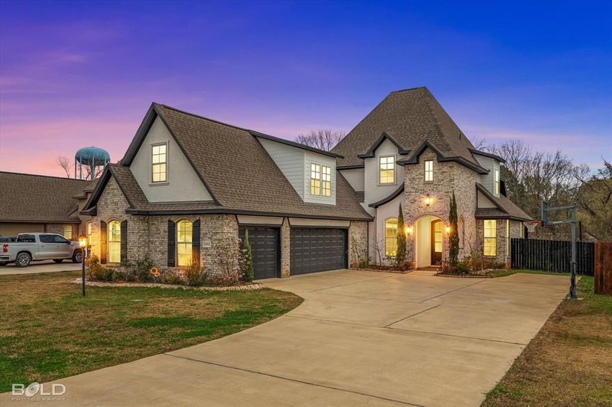 Gorgeous home in Dogwood South gated community with all the amenities one could need! Step inside this 5-bedroom, 3-bath home that offers 2,653 square feet of thoughtfully designed living space. This family-friendly community is just minutes from Barksdale AFB, I-20 and I-220. The layout is designed to accommodate modern living while offering versatility and room to grow. This home has an open floor plan with tall ceilings, large island, stainless steel appliances, gas cooktop, tile backsplash and walk in pantry in the kitchen to name just a few. The Large windows fill the space with natural light, creating a bright and inviting atmosphere perfect for both everyday living and entertaining. Wood tile floors throughout the house with carpets in the bedroom. Gather around the gas log fireplace in the inviting living room, which flows seamlessly into the dining area. A tankless water heater ensures you'll have endless hot water throughout the home.  A versatile bonus room offers flexibility as a home office, media room, or secondary living area. The primary suite serves as a true retreat, complete with a spacious walk-in closet, double vanities, a jetted soaking tub, glass and tile walk-in shower. The layout of this home is genius, & you will no doubt love it! The sizeable laundry room is conveniently located just off the oversized 3-car garage, making daily routines a breeze. The home was built in 2022, and you can tell the owner has meticulously maintained it. The location with no rear neighbors will give you the privacy you have been looking for.   With so much to offer and priced to sell, this beauty is the perfect home. Located in the Haughton school district and close to all the restaurants, shopping and entertainment for the area. Don’t miss this incredible opportunity in a desirable community—schedule your private showing today