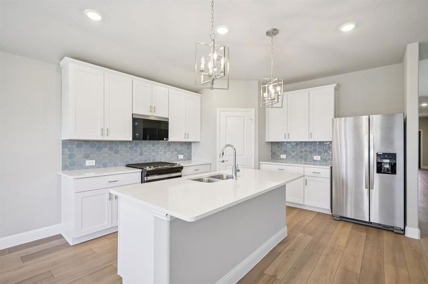 BRAND NEW energy - efficient home Feb 2026! The open concept living area includes a versatile flex space that makes a beautiful formal dining room. White cabinets with veined white quartz countertops, beige tone EVP flooring with beige tweed carpet.  From the $300s - Escape the bustle of the city without being too far from the action. Beat the summer heat at the private neighborhood amenity center with a pool and playground. Look forward to a future public park, adjacent to the neighborhood, equipped with pickleball courts, soccer fields, and so much more. Zoned for Anna ISD, Parks at Foster Crossing offers 12 unique floor plans to fit any lifestyle. Contact a sales counselor to learn more. Each of our homes is built with innovative, energy-efficient features designed to help you enjoy more savings, better health, real comfort and peace of mind.