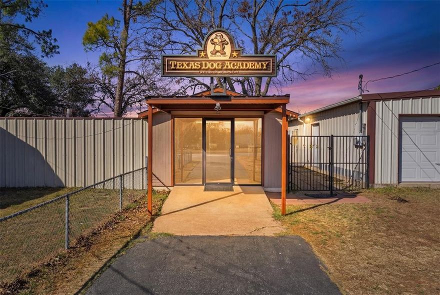 Rare opportunity in Granbury to acquire a highly versatile live work and business capable property on approximately 1.06 acres, located outside city limits with exceptional flexibility for a variety of uses. The site includes a well maintained on site residence ideal for an owner operator, along with an expansive spray foam insulated workshop of approximately 1,500 square feet, a separate office building, additional flex and storage space, and a small paved parking area at the front of the property.

For more than 30 years, this property has successfully served as a dog training, grooming, and kennel facility, offering a unique turnkey setup for veterinary services, animal care professionals, trainers, or other service based businesses seeking established infrastructure. Functional improvements throughout make this an exceptional commercial offering with wide potential for future use.