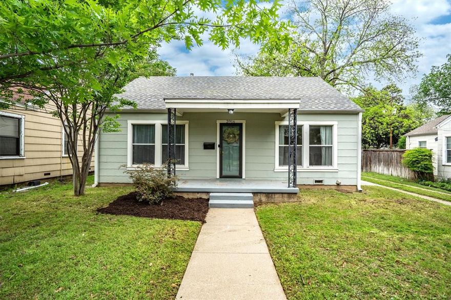 Welcome home! Nestled in Fort Worth, this charming home greets you with an adorable front porch, perfect for morning coffee or relaxing evenings. Step inside to discover a spacious living area centered around a warm, inviting fireplace, creating the ideal space for gathering and unwinding. The bright, clean white kitchen offers a fresh and timeless feel, seamlessly flowing into a dining area complete with built-in cabinets and shelves for added character and storage. Just off the kitchen, a versatile bonus room provides the perfect space for a second dining area, formal sitting room, or flex space to suit your needs. An expanded closet adds extra storage and conveniently accommodates a stacked washer and dryer. The primary bedroom is filled with natural light, creating a light and airy retreat, and features an expanded closet for enhanced functionality. A secondary bedroom and full bathroom offer comfort and convenience for guests or loved ones. Step outside to a private backyard oasis, shaded by mature trees and designed for relaxation. Enjoy outdoor living on the deck area, perfect for entertaining or simply enjoying the peaceful surroundings.