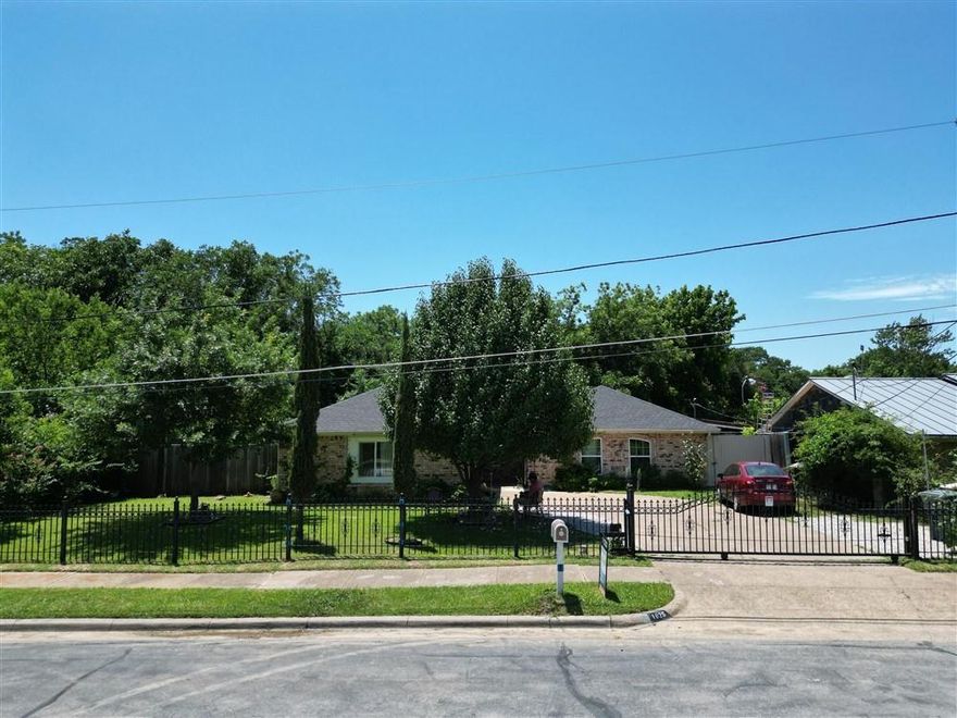 SELLER IS EAGER TO SELL! BRING YOUR OFFER! This BEAUTIFUL spacious 4 bedroom, 3 bathroom property is surrounded by lush mature trees in the backyard, ideally situated in a highly sought-after neighborhood! Natural light streams through the windows, creating a warm and inviting atmosphere throughout the house. The generously sized kitchen offers ample space for dining and seamlessly opens to the living room with unique high ceilings where an accented fireplace  adds a touch of elegance. The kitchen includes beautiful granite countertops, decorative backsplash and an abundance of storage within all the cabinetry! Conveniently Electric Gate for private parking. Schedule your showing today.