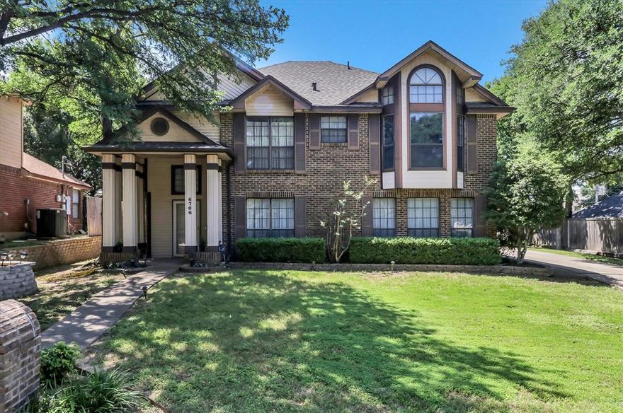 Beautiful curb appeal, mature trees, and a spacious layout come together in this well-maintained home located in the highly desirable Shorewood Estates neighborhood near Lake Arlington. Known for its scenic surroundings and established charm, this beautiful mature neighborhood is loved for its peaceful atmosphere, where neighbors enjoy walking to the park, strolling around the lake, and taking in the natural beauty of the area.

Offering 4 bedrooms, 2 bathrooms, and over 2,300 square feet, this two-story home features multiple living and dining spaces designed for both everyday comfort and entertaining. The inviting living area showcases a cozy brick fireplace, while the kitchen offers abundant cabinetry, generous counter space, a pantry, and a bright breakfast area overlooking the backyard. The oversized primary suite includes an ensuite bath with dual sinks, jetted tub, and walk-in closet. Secondary bedrooms provide flexibility for guests, home office space, or growing households.

Step outside to enjoy the large backyard with mature landscaping and plenty of room to relax, play, or entertain under the covered patio. Conveniently located near I-20, shopping, dining, parks, and Arlington ISD schools, this home offers comfort, space, and opportunity in one of Arlington’s most established lake-area communities.