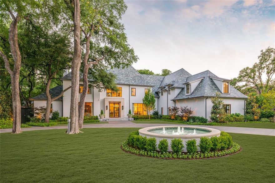 Completely redesigned and modernized, offering 6 bedrooms & 7.2 baths spanning 9,053 SF on 2.25+ acres, this gated sanctuary boasts a tranquil park-like setting along Bachman Branch Creek, offering breathtaking views. Inside, the main floor's high ceilings & hardwood floors lead you to the primary suite, that includes a sitting area and a luxurious ensuite bath with a double walk-thru shower & soaking tub. The paneled office with fireplace, a chef's kitchen with high-end appliances, and a Butler's pantry with a walk-in pantry cater to sophisticated living. Upstairs, discover 4 bedrooms with ensuite baths, a generous recreation room, and a bonus room, perfect for crafts or hobbies. Outside, the property offers a substantial front and back yard, and a rooftop deck, perfect for enjoying the natural beauty that surrounds the home. A 4-car garage, stunning infinity pool w spa, pickleball court, & heated & screened outdoor living area with kitchen & fireplace perfect for year-round enjoyment, complete this residence.