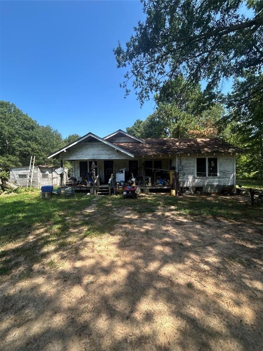 This 3-bedroom, 2-bath home offers a unique opportunity for those with a vision. Sitting on 2.88 acres of quality land, providing space, privacy, and room to make it your own. With well water, a septic system in place, and plenty of open ground, the foundation for a great getaway or homestead is already here. There are 3 sheds on the property, perfect for tools or storage. Located only 30 miles from Broken Bow, this property could be transformed into a summer cabin, weekend retreat, or quiet country escape. Bring a vision, and some farm animals to make it yours!