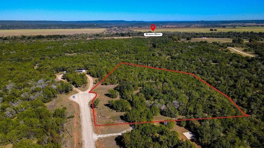 Welcome to 170 Wooded Crest Ln in Palo Pinto Tx. Escape the city and embrace peaceful country living on this 5.3 acre tract in the private gated Community of River Canyon Ranch. Featuring 360-degree views of the beautiful Palo Pinto Mountains, the property has mature oak and cedar trees, offering exceptional privacy,  natural beauty and abundant wildlife. Enjoy the benefits of an ag exemption and exclusive access to the Brazos River via a community area, perfect for hiking, fishing and recreation. Paved roads and electricity available, this property is ready for your dream home or weekend retreat. Property Owners are only allowed to fence in 1 acre to ensure the ag exemption. Minutes from Palo Pinto Lake, 20 Miles from Mineral Wells, 38 Miles from Weatherford.