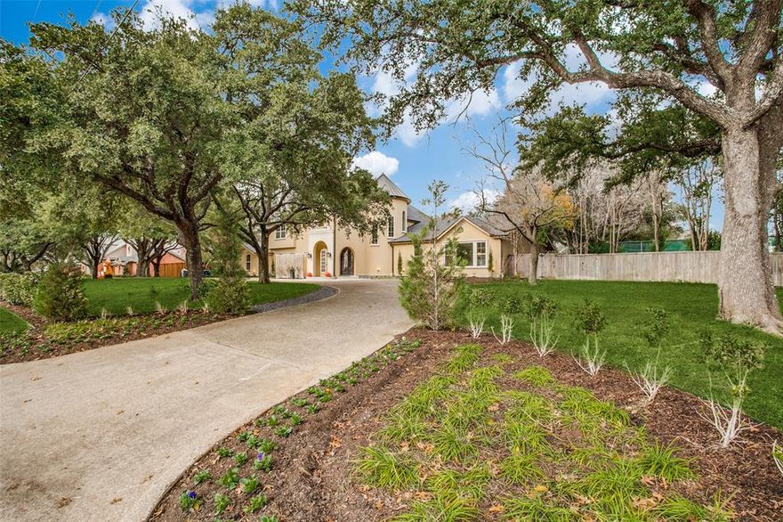 Amazing opportunity on 1+ acres in the private school corridor.  Traditional floor plan with a Mediterranean twist.  Two main bedrooms.  One upstairs and 1 downstairs.  2 additional bedrooms down and 2 additional upstairs.  1 of the downstairs bedrooms can serve as a hidden office or room.  Big office or library downstairs with doors for privacy. Kitchen has top of the line appliances with dual dishwashers. Can be your oasis in the city!