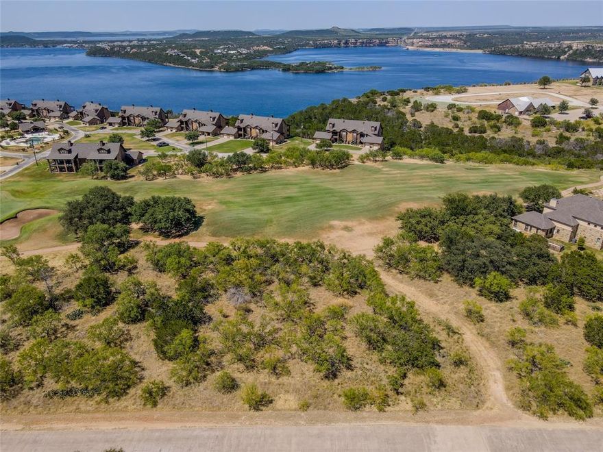 Build your dream home on this beautiful golf course lot in one of Possum Kingdom Lake’s premier gated communities with a 24 7 guarded entrance. Enjoy 36 complimentary rounds of golf per year and direct views of the fairway right from your backyard. Owners have access to resort-style amenities including a marina, boat ramp, community dock, pool, fitness center, clubhouse, restaurant, and tennis courts. With parks, playgrounds, and scenic surroundings, this is the ideal spot for a full-time home or weekend retreat.