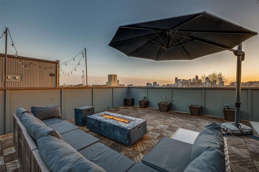 Enjoy breathtaking skyline views from the spacious 4th floor roof-top and an unbeatable lock-and-leave lifestyle in the heart of Dallas. This row of  townhomes was designed for today’s modern homeowner by award-winning architects, Far + Dang. The exquisite finish-out includes 10ft ceilings and 8ft doorways that create a very spacious vibe, Bosch appliances, solid-oak nail-down hardwood floors, quartz countertops, Nobilia German cabinets with soft-close hinges, tankless water heater, EV charging outlet, smart home features, pre-wiring for optional fans or speakers and relaxation-inspiring five-fixture master baths with double shower heads. The residence showcases a gated front yard, gated driveway, soaring ceilings, expansive windows that flood the home with natural light, a private balcony and thoughtfully curated finishes throughout. The open-concept layout creates an effortless transition between kitchen, dining, and living spaces—ideal for hosting gatherings or enjoying quiet evenings at home. 

Retreat to the spacious primary suite, where spa-inspired elements create a true sanctuary experience. Each bedroom has its own ensuite bath and offers flexibility for guests, a home office, or fitness space, making this townhome as functional as it is stylish.

Perfectly positioned near Lower Greenville, Knox-Henderson, Uptown, and Downtown Dallas. Enjoy immediate access to premier dining, nightlife, shopping, and outdoor recreation. Whether you're seeking vibrant city energy or refined modern comfort, this exceptional Radford Court townhome delivers the best of both worlds.

Step into this opportunity to experience contemporary modern luxury in one of East Dallas’ most desirable locations.