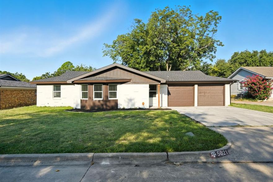 FULLY RENOVATED IN NORTH RICHLAND HILLS! 4 Beds – 2 Baths – LVP Flooring – Updated Kitchen – Modern Baths – Just $310,000. Located in Birdville ISD, this 1458 sq ft home has been thoughtfully updated inside and out. The kitchen features freshly painted cabinets, black hardware, granite countertops and a white subway tile backsplash. Light wood luxury vinyl plank floors flow throughout the main areas, creating a warm and inviting feel. Both bathrooms are fully remodeled with new vanities, fixtures, lighting, and tile, including a glass-enclosed shower in the primary suite. Recent improvements include a new roof, new windows, gutters, French drains, foundation repair, full interior and exterior paint, and all cast iron plumbing replaced with PVC! With its modern finishes and a great location near shops, dining, and major roads, this one is move-in ready and built to impress.