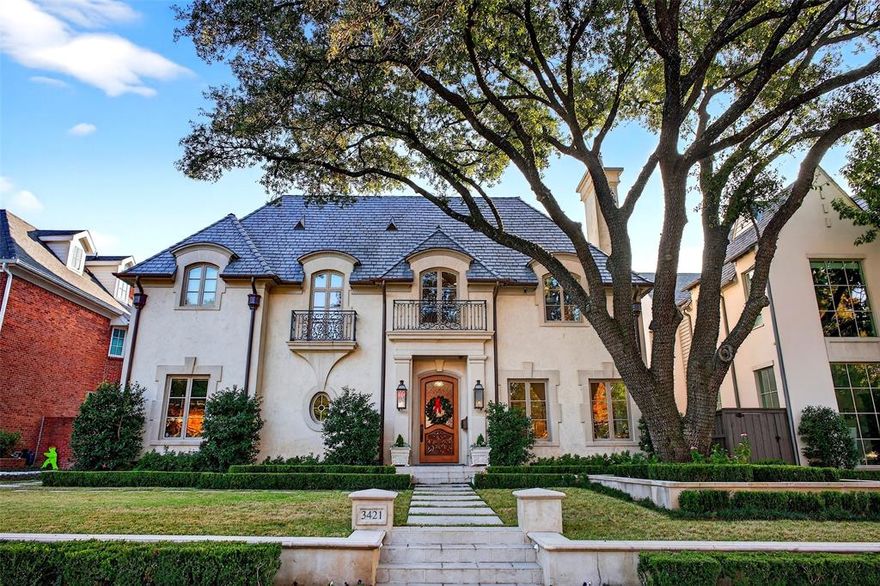 Experience elevated living in this immaculate Highland Park home, blending luxury and livability just steps from Armstrong Elementary. Designed to feel both sophisticated and relaxed, the home offers an open floor plan ideal for effortless entertaining. With 5 bedrooms, 6.2 baths, and five fireplaces, the interiors are richly appointed. The chef’s kitchen features Wolf appliances, a built-in SubZero refrigerator, and a Miele coffee machine, while a unique wine cellar connects both the formal dining room and kitchen.

The gorgeous, spacious primary suite provides a serene retreat. Beyond the main living areas, you’ll find leathered bar ceilings, French doors opening to artificial turf, and beautiful landscaping, creating an inviting indoor–outdoor flow. The home sits on a generous 65 x 150 lot, offering exceptional space and privacy.

A detached back house includes a golf simulator and movie theater, not counted in the home’s square footage, and can be converted back to a three-car garage if desired. Additional features include a built-in grill, camera system, and integrated audio throughout.

A remarkable opportunity to enjoy refined comfort and premier walkability in the heart of Highland Park.