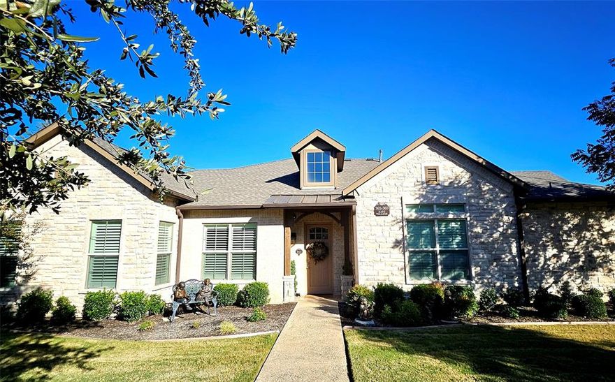 Luxury senior living single story villa located in east Village of Watermere at Southlake. This is an open floorplan with lots of windows and tall ceilings. The doors are all 8' and solid core.  This villa has an elegant trim package, custom plantation shutters, and engineered wood floors thru out all the living areas.   Both bedrooms have private ensuite baths and there is 1 half bath for guest off the kitchen.  The study has built-in cabinetry, ceiling fan and french doors for privacy.  The living area has 10' ceilings, cedar beams canx lights and a ceiling fan.  There is a gas log fireplace with an electric starter. This is the smallest most open floorplan in Watermere. There is a 2 car attached oversized garage with cedar garage doors.  The laundry room has built in cabinets.  Residents enjoy a low-maintenance lifestyle with club membership included in the price.  Membership provides access to resort-style amenities such as concierge services, security, golf, fitness center, water aerobics, scheduled activities and games! Dining in the casual cafe or large formal dining room.  Experience the perfect blend of luxury, convenience and community living  just minutes away from shopping, dining and more.