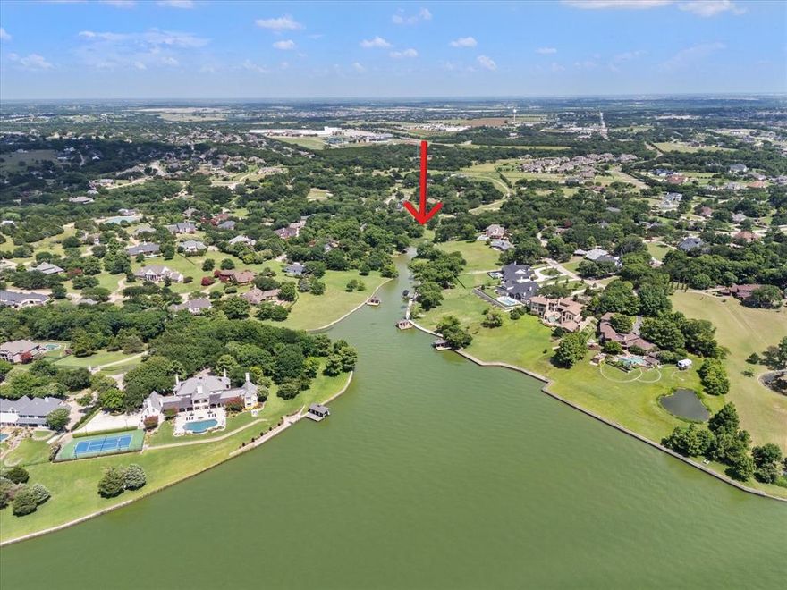The most unique & interesting ACREAGE building site in Heath Tx. especially if your'e looking for TREES, PRIVACY, SECLUSION & EXCLUSION!! 
Nearly 5 ACRES with LAKE ACCESS (technically WATERFRONT). NO HOA-means separate building can be built, RV's OK, Boats OK, Animals OK, Guest House & Barndo (must meet city code and or restricitons) TONS of HUGES TREES, lots of beautiful rolling topography with a several awesome homesite locations to choose from. Potential for a large private lake to be added to the back of the property above the lake front. If you have the vision (and the $$) this could be an absolute show stopper estate! Schedule a private tour on site.