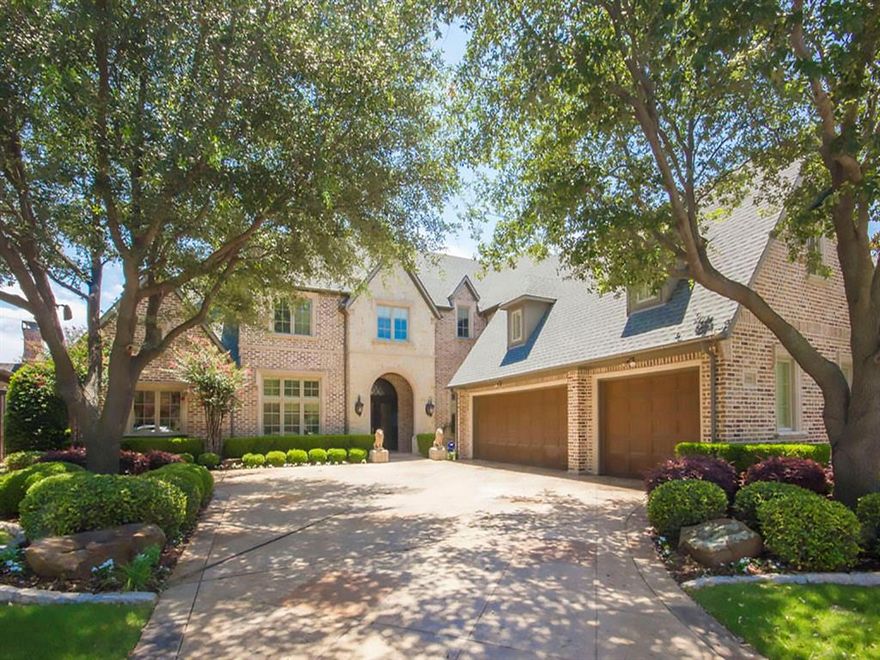 Located near The Star, this gorgeous custom home sits in a gated community & faces a private park. It features spacious formal living & dining rooms, family room overlooking the pool, an open kitchen, a wet bar, 1st floor media room, 1st floor guest suite, walk-in climate-controlled wine room, formal study, which shares a see-through fireplace with the formal living room, an outdoor living area, pool & oversized three-car garage. The kitchen features granite counters, SS appliances & a built-in refrigerator. The master suite features hardwood flooring, fireplace & a huge master bathroom, complete with an oversized shower & large walk-in closet. Upstairs there are three bedroom suites, 2 living areas, & lots of floored attic space. Hardwood floors flow throughout most of the first floor & large sections of the second floor as well. In the backyard, the large covered patio & pool are surrounded by trees, giving you complete privacy.