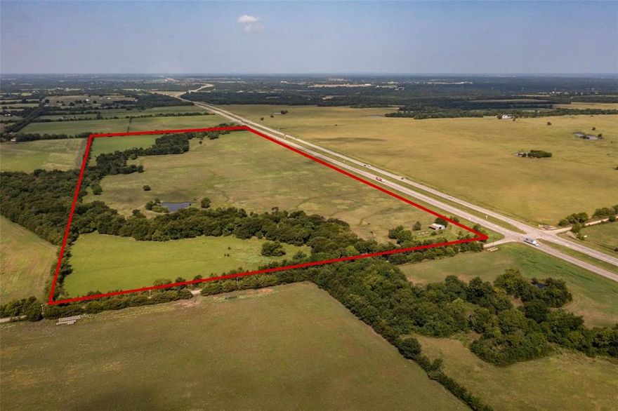 Large HWY 82 Frontage about 2100 sq.ft also has 1544 County Road which connects to Silo Rd,  Currently Leased currently to Cattle Farmer, Total acerage is 77.428 will be subdived to 27.428 acrage.
1 mile to Bonham Exist, Could be commercial in future due to its nature.