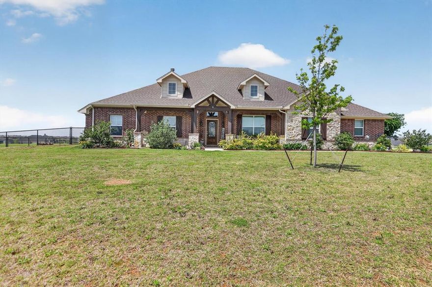 Set on a full acre in Godley, this beautifully designed 4-bedroom, 2.5-bath home offers the space, flexibility, and modern finishes today’s buyers are looking for while still keeping you conveniently connected to everything you need.

Inside, you’ll find a functional split-bedroom layout, dedicated office, and a separate media room. Perfect for working from home, entertaining, or everyday living. The open-concept main area features durable wood-look tile and flows seamlessly into a standout kitchen with a large quartz island, stainless steel appliances, custom cabinetry, and designer backsplash.

The private primary suite is designed for comfort with dual vanities, a soaking tub, separate shower, and a spacious walk-in closet. Secondary bedrooms are thoughtfully positioned for added privacy.

Step outside and experience what truly sets this property apart a fully fenced 1-acre lot with room to build, play, or expand. A poured 14x20 slab with attached 10x20 covered patio is already in place, ideal for a future shop, outdoor kitchen, or additional entertaining space.

Beyond the property, enjoy the convenience of being just a short drive to shopping, dining, and everyday essentials in nearby Cleburne and Burleson. With easy access to the Chisholm Trail Parkway, commuting to Fort Worth is simple making this home the perfect balance of country space and city accessibility.

Additional highlights include a 3-car garage, oversized laundry room with built-in storage, and the quiet, open feel that makes Godley one of the most desirable growing areas just outside Fort Worth.

If you’ve been searching for space, functionality, and a property that offers both privacy and convenience this one delivers.