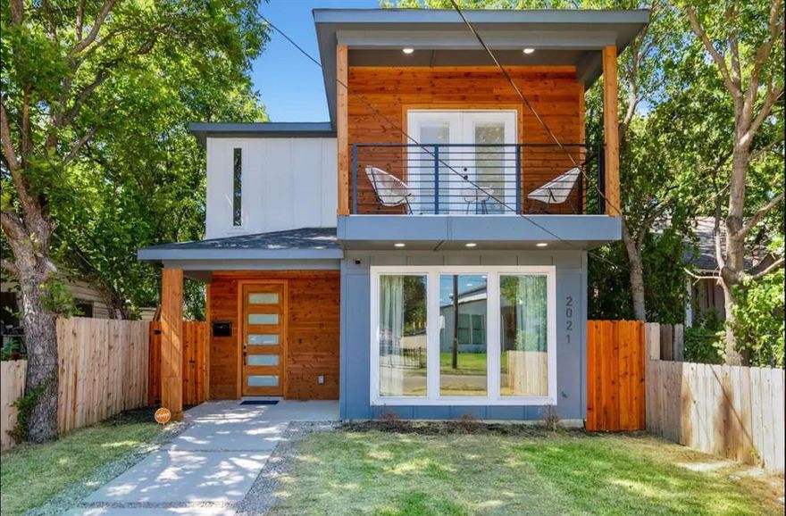 Welcome to modern living in the heart of Dallas! This stunning 4-bedroom, 3-bath home offers 2,328 square feet of stylish and functional space just minutes from Downtown. Built in 2021, this two-story residence boasts an open-concept layout with a chef’s kitchen featuring quartz countertops, stainless steel appliances, bar seating, and an eat-in area that flows into the spacious living room with electric fireplace. A full bedroom and bathroom downstairs provide flexible living arrangements. Upstairs, enjoy a cozy game room and three additional bedrooms, including a luxurious owner’s suite with a private sitting area, balcony, dual vanities, smart mirror, oversized walk-in shower, and a generous walk-in closet. Additional highlights include decorative lighting, luxury vinyl plank flooring, and full-size laundry room. The exterior offers a gated driveway, rear-facing single-car garage, and covered patio. Located in Dallas ISD with convenient access to shops, dining, and major highways, this home is available for lease starting August 1st. Pets welcome with deposit. Schedule your private showing today!