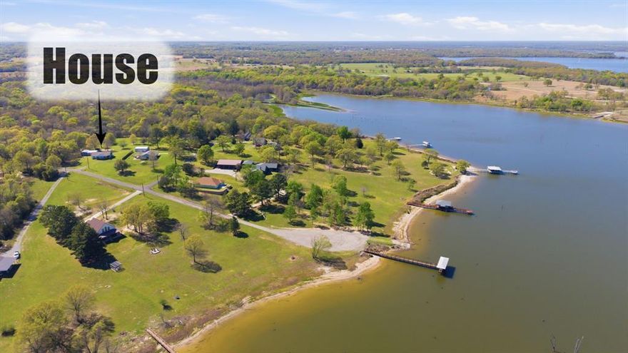 Want to sit on your front porch and watch the Sunrise over Lake Fork?  If so, this is the spot for you.  Very well-appointed home that was remodeled in the last 5 years.  Roof is only 5 years old too!  This 3 bedroom with an office home, is open concept.  With Just over 3 acres, there is room for a horse.  Home has a large shop big enough for a boat, it will fit an 18' boat, a carport, and another very large storage area that can be used for animals or general storage.  Cozy and well kept, this home would be great for a family or a weekend getaway for the people who love to fish and boat in your life.