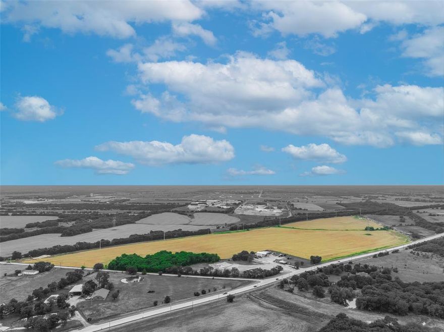 This 65-acre lot is located outside of city limits, within Royse City, TX. Positioned at the prime corner of State Highway 66 and FM 1031, the property features dual access points with over 1,300 feet of valuable highway frontage. Across the street will be a future development of another Collin College Campus, with an average enrollment of ±58,805 students, and the new Royse City Police Station. With utilities to the site, including city water and city sewer, the property is ready for development within a fast-growing community. Contact the listing agents for more information.