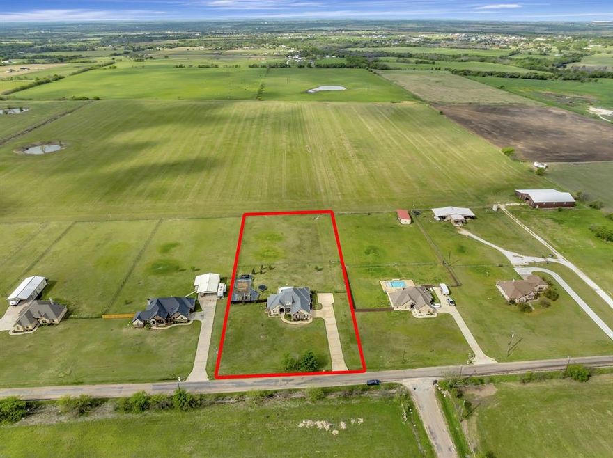 Looking to enjoy the peaceful country but also have a quick commute to the city then this is for you! Beautiful 4 bedroom, 3 bath home on 2 acres in Rio Vista ISD! From the moment you enter the home you will be welcomed by a beautiful open entryway with a luxury office space to your right with custom built in solid wood shelves. This great flex space can be used as an office, formal dining area, 4th bedroom, etc., options are endless! There is not a detail unnoticed in this home from the open concept floor plan, large living room with stone covered fireplace, bright and spacious kitchen, large bedrooms with walk in closets, master bath retreat that offers separate tub, shower and a double sink, oversized washer and dryer area with an extra space that could be used as a craft room and so much more!! Out back you will find a custom built covered back patio area great for family get togethers. With 2 acres of fully fenced space you could easily put in a future pool or a large shop. There have been trees planted and there is a custom garden area that will stay. Welcome home!