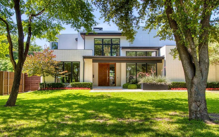 This custom built; one owner contemporary home is nestled in Forest Hills on nearly a one-half acre treed lot & is a short walk from White Rock Lake & The Dallas Arboretum. Flooring for the downstairs living areas is white oak and the walls have a museum finish. The open floor plan has been designed for maximum family comfort as well as easy entertaining. The primary suite & guest suite are located downstairs along with a home office & study, perfect for those who need separate work areas. Upstairs, you'll find two en-suite bedrooms, game room & media room. There is also 334 sqft of unfinished space upstairs just waiting for your design ideas. A mudroom & large pantry are adjacent to the over-sized one car garage & two car garage offering plenty of space for all of life's necessities. Outside, there is a large, screened patio with a built-in grill & plenty of space for dining, cooking & lounging. The back yard is enormous offering a blank canvas for the addition of a pool.
