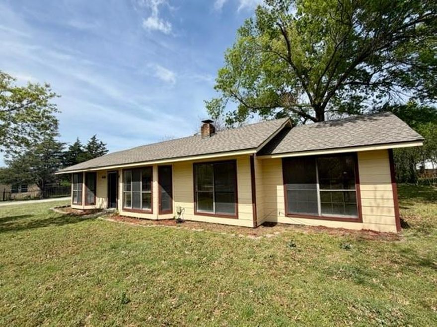 Lovely home located on double corner lot with beautiful shade trees and privacy. Also a great investment opportunity in revitalizing town.