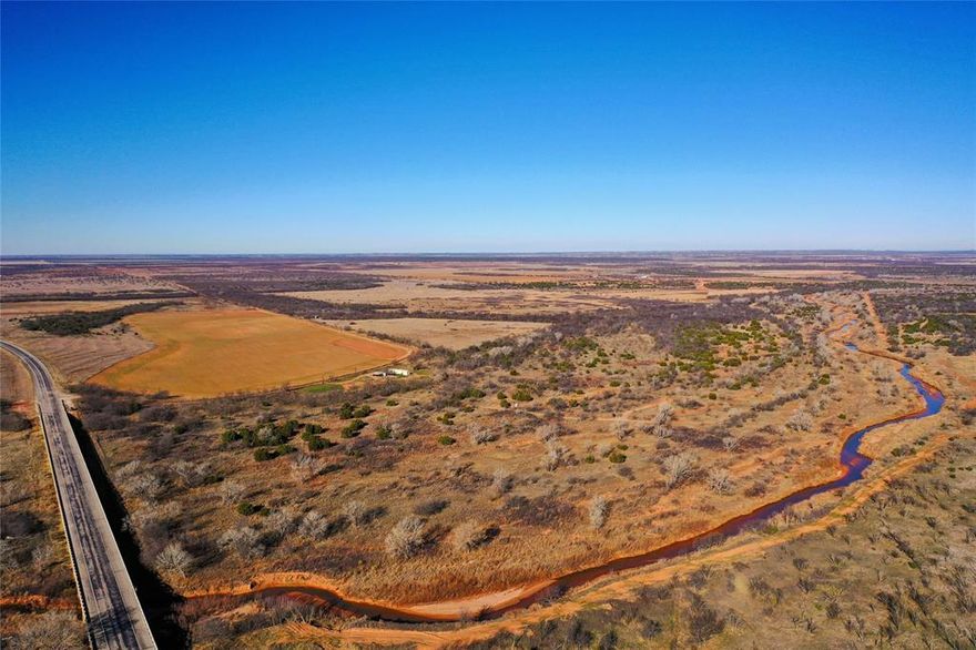 Nestled along the Double Mountain Fork of the Brazos River, this wonderful hunting property offers a rare opportunity to own prime riverfront land with endless possibilities. Whitetail deer are plentiful, and the property also provides excellent hunting for turkey, dove, hogs, predators, and quail, making it a true sportsman’s paradise. City water and co-op electricity are already in place, adding convenience to this exceptional setting. A cozy and inviting two-bedroom, two-bathroom home sits on the property, complete with porches that overlook the scenic landscape and well-maintained food plots in excellent condition. Ideally located just 20 minutes from Haskell, riverfront hunting properties like this are hard to find—this one is sure to amaze and won’t last long.