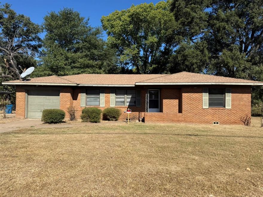 Charming brick home located at 1206 W Royall Street in Malakoff, Texas. This 3-bedroom, 1-bath residence was built in 1971 and offers solid construction with timeless appeal. The property includes an additional lot, providing extra space and flexibility for outdoor living, expansion, or investment potential. A carport offers covered parking and convenience. Situated in an established neighborhood, this home presents a great opportunity for homeowners or investors seeking space, value, and location in Malakoff.