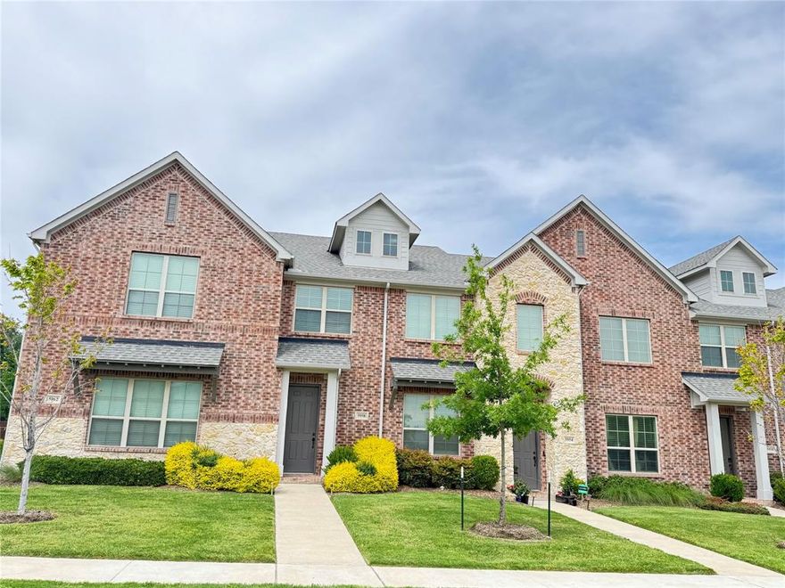stylish 2-bedroom, 2.5-bath townhome ideally located in sought-after McKinney, just moments from Stonebridge Ranch Country Club and minutes to HWY 121 & HWY 75. Step inside to an impressive two-story family room with soaring 20-foot ceilings, creating a bright, open, and inviting atmosphere that flows effortlessly into the modern kitchen. Designed with both style and function in mind, the kitchen features quartz countertops, stainless steel appliances, a classic subway tile backsplash, and a spacious pantry. Rich wood flooring throughout the first floor adds warmth and elegance, perfectly complementing the home’s contemporary design. Upstairs, a versatile loft offers the perfect space for a home office, media room, or flex area, along with the convenience of upstairs laundry. The primary suite is a true retreat, highlighted by vaulted ceilings, a generous walk-in closet, and an en suite bath with additional linen storage. Built for efficiency and comfort, this home includes a tankless water heater and dual thermostats. Enjoy a low-maintenance lifestyle with HOA-covered yard care—no more yard work, just more time to relax and enjoy your home.