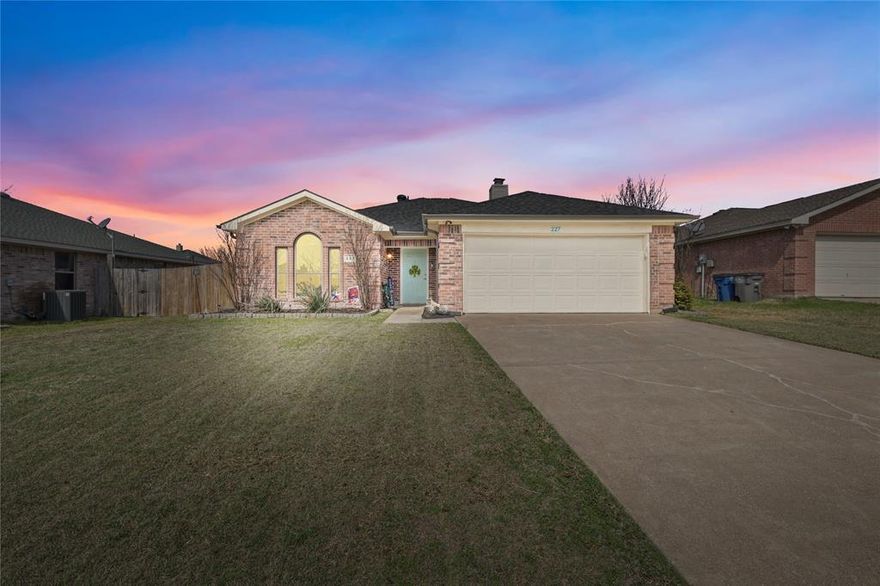Beautifully updated and move-in ready, this inviting home blends modern finishes with warm, comfortable living spaces. The fully remodeled kitchen serves as the heart of the home, featuring an expansive layout with abundant cabinetry, extended counter space, sleek finishes, and a clean, contemporary design that’s perfect for both daily living and entertaining. Open sightlines connect the kitchen to the main living area, where a stylish shiplap fireplace wall creates a striking focal point and an ideal space to gather.
Luxury vinyl plank flooring flows seamlessly throughout the home, offering both durability and a cohesive, upscale look. Fresh interior paint, updated trim, modern light fixtures, and ceiling fans enhance the bright, airy feel in every room. The primary suite provides a peaceful retreat with a beautifully redesigned ensuite bath showcasing a spacious double vanity, updated fixtures, and a spa-like atmosphere. Secondary bedrooms are generously sized and versatile, perfect for guests, home office space, or growing households, and the updated guest bath features clean lines and contemporary finishes.
Recent major improvements include a new roof and new windows, providing improved energy efficiency, natural light, and long-term peace of mind for the next owner.
Outside, the home continues to impress with refreshed landscaping and flower beds that boost curb appeal, a solid privacy fence, updated exterior lighting, and a well-maintained yard ideal for relaxing or entertaining. The insulated garage adds year-round comfort and functionality, while major system improvements and thoughtful enhancements throughout provide peace of mind.
This home offers the perfect combination of style, functionality, and pride of ownership—an ideal opportunity for buyers seeking a turnkey property with modern charm. Located within highly regarded Wylie ISD, offering access to top-rated schools and a strong sense of community.